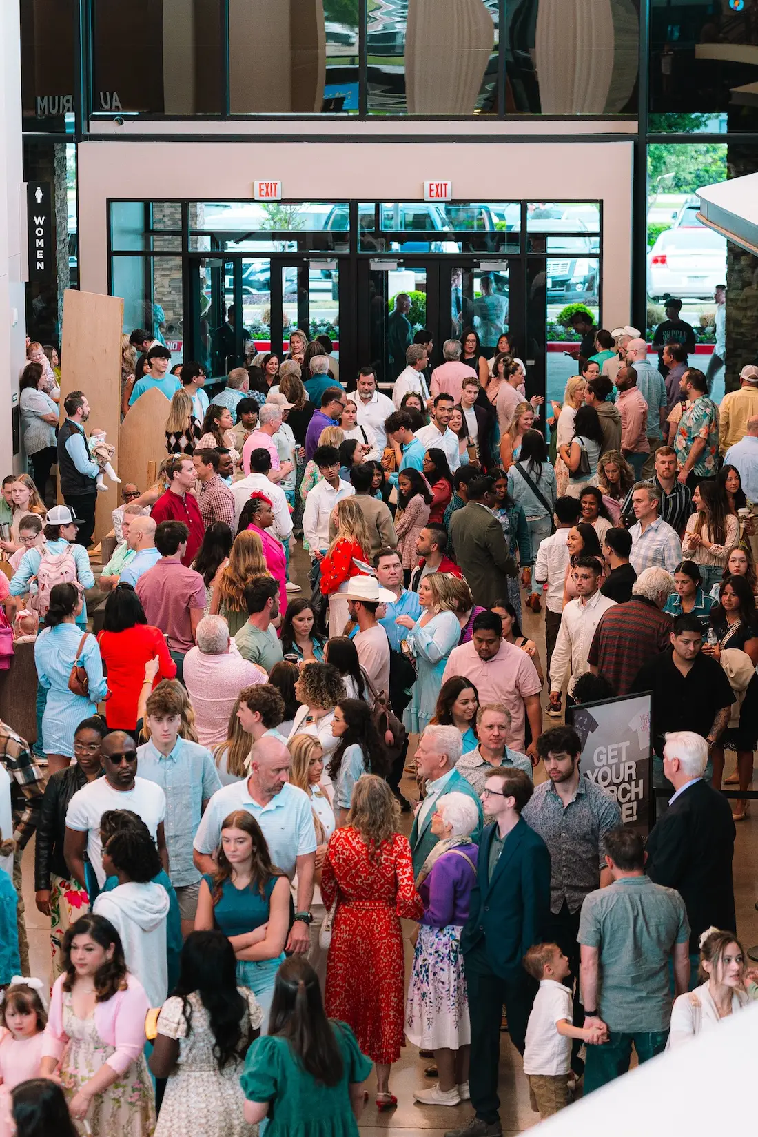 People gathered together in the church lobby
