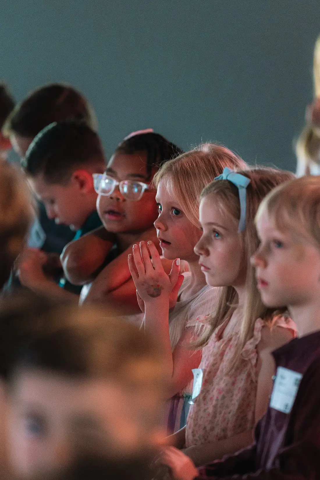 Children standing together during a group activity
